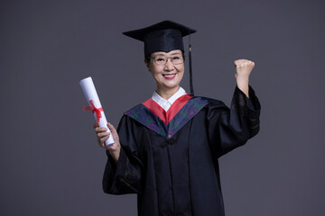 Senior Chinese student cheering for graduation