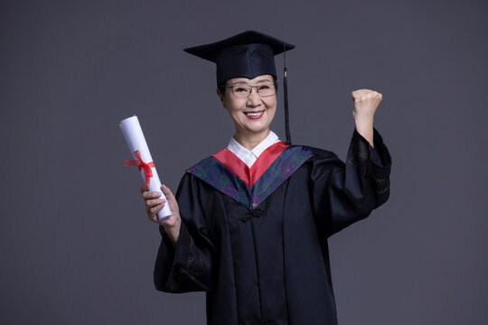 Senior Chinese student cheering for graduation