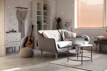 Interior of living room with disco ball and sofa