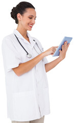 Pretty nurse using tablet pc