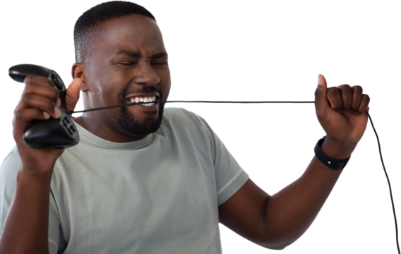 Frustrated man biting a wire of joystick - Powered by Adobe