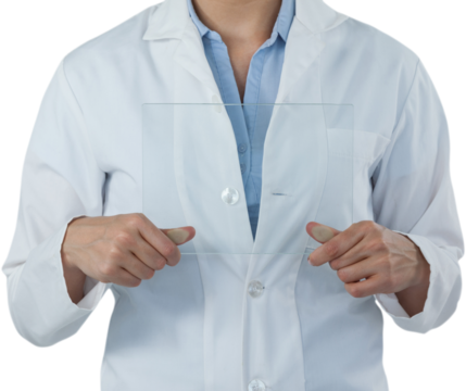 Midsection of female doctor holding digital tablet while using digital screen