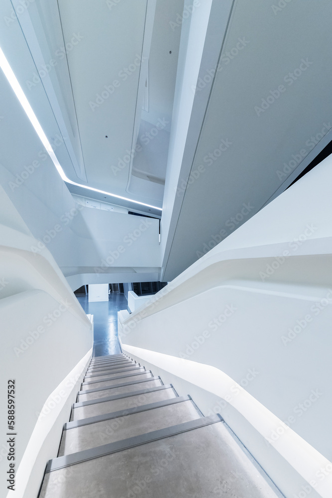 Aufkleber empty futuristic stairway in modern building. architectural abstract background