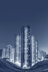 High rise residential buiilding of public Estate in Hong Kong city at dusk