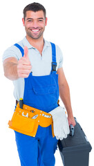 Happy repairman with toolbox gesturing thumbs up