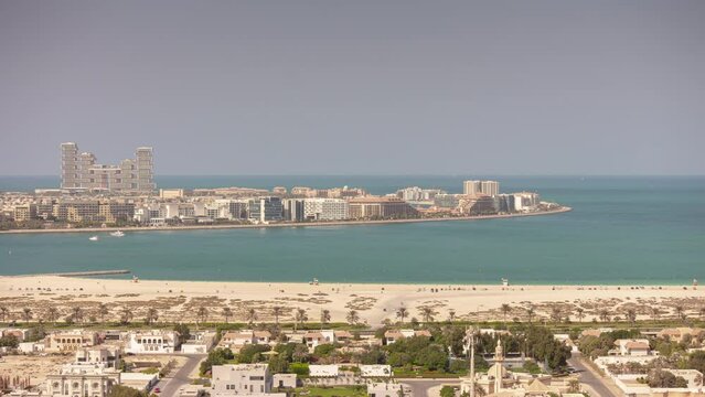 day time dubai city bay traffic palm island most famous luxury new modern hotel front rooftop panorama 4k timelapse uae