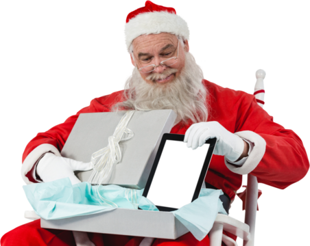 Santa Claus holding digital tablet and gift box - Powered by Adobe