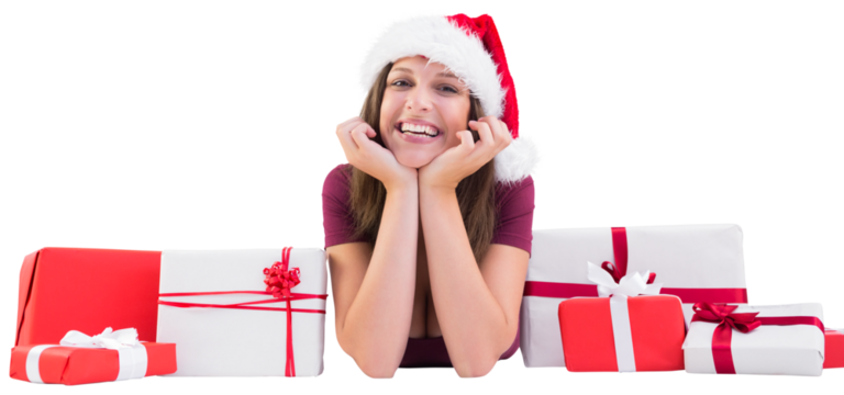 Festive brunette lying on the floor with gifts