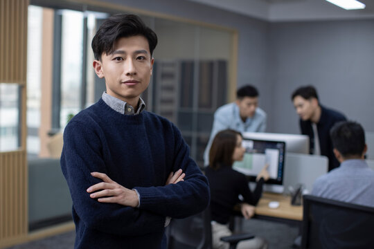 Portrait of Chinese IT worker in office