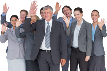 Smiling business team waving at camera