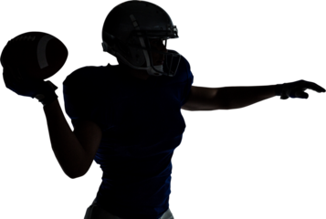 Silhouette American football player throwing ball