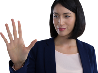 Businesswoman touching invisible screen