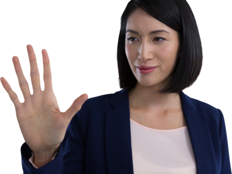 Businesswoman touching invisible screen