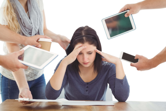 Depressed businesswoman with head in hands