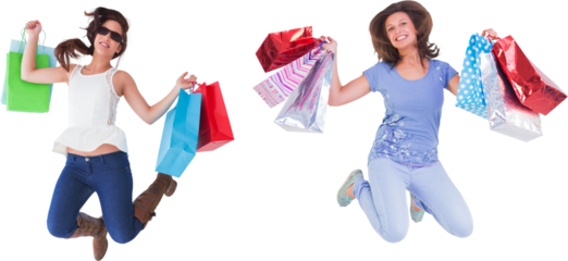 Women holding shopping bags while jumping