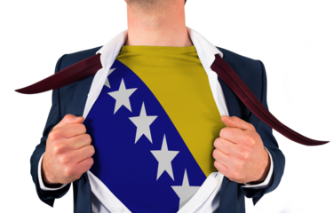Businessman opening shirt to reveal bosnia flag