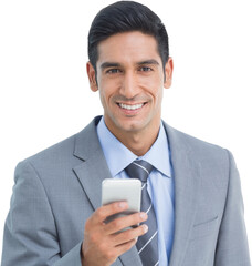 Businessman using mobile phone with colleagues behind
