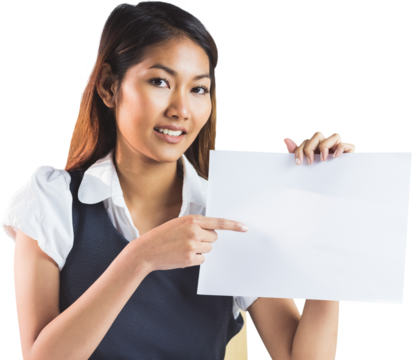 Smiling businesswoman pointing a sheet of paper