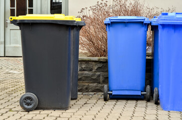 Garbage containers on city street