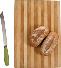 Bread on cutting board with knife