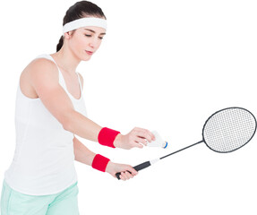 Young woman playing badminton