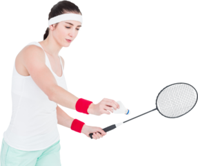 Young woman playing badminton