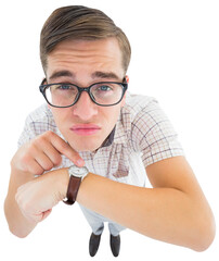 Geeky hipster pointing to his watch