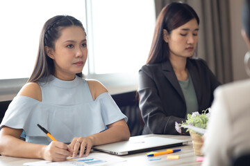 Obraz premium Professional business team people and manager in meeting with laptop computer. Asian business man and woman