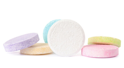 Colorful soluble tablets isolated on white background