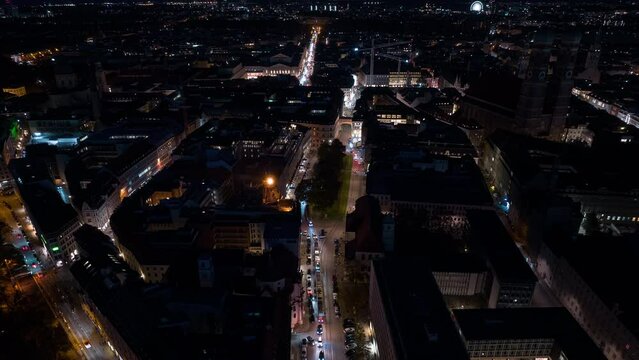 night illumination munich city center traffic street square aerial topdown panorama 4k timelapse germany