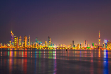 Kuwait Skyline view from beach during the national day celebration. Kuwait National day lights on...