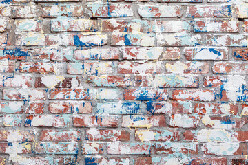 The brick wall painted with color paints