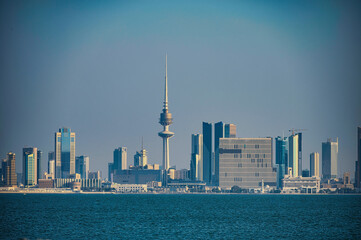 Kuwait skyline view from the Cornish during the late evening , sunset view of Kuwait City with skyline. Sea and city visible...