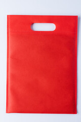 Close up of red bag with copy space on white background