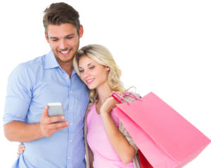 Attractive young couple holding shopping bags looking at smartphone