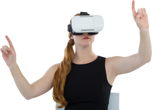 Female executive using virtual reality headset