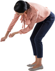 Female executive pretending to be holding invisible object