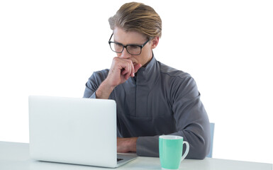 Businessman looking into laptop