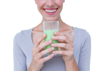 Fit woman holding healthy juice