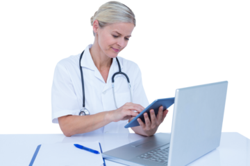 Female doctor using digital tablet