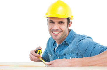 Male carpenter using measue tape