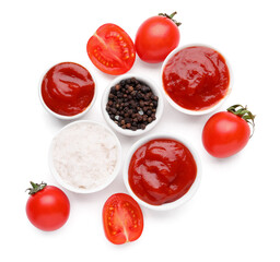 Bowls of tasty ketchup, peppercorn, salt and tomatoes isolated on white background