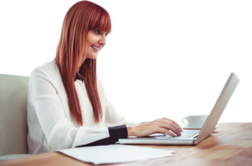 Smiling hipster businesswoman using her laptop