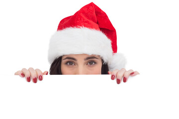 Festive brunette showing white poster