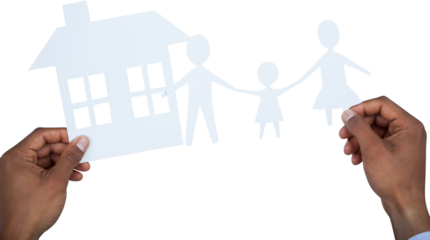 hands holding a family with her house in paper
