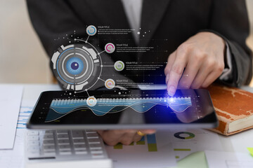 Technology and financial advisory services concert. Business woman working on digital tablet and laptop computer with advisor showing plan of investment to clients at table office. Digital marketing.