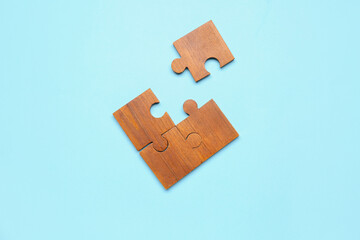 Puzzle pieces on blue background. World Autism Awareness Day