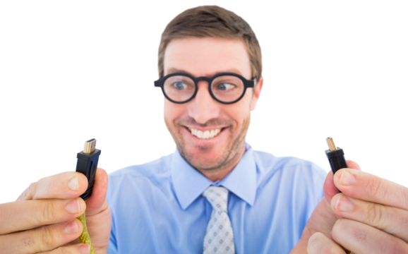 Geeky businessman holding two cables - Powered by Adobe