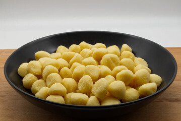 Fresh raw uncooked Italian Gnocchi di patate, Potato Gnocchi.
