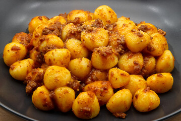 Italian Gnocchi di patate, Potato Gnocchi, with bolognese sauce.